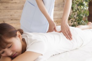 Young woman has received a massage of the waist